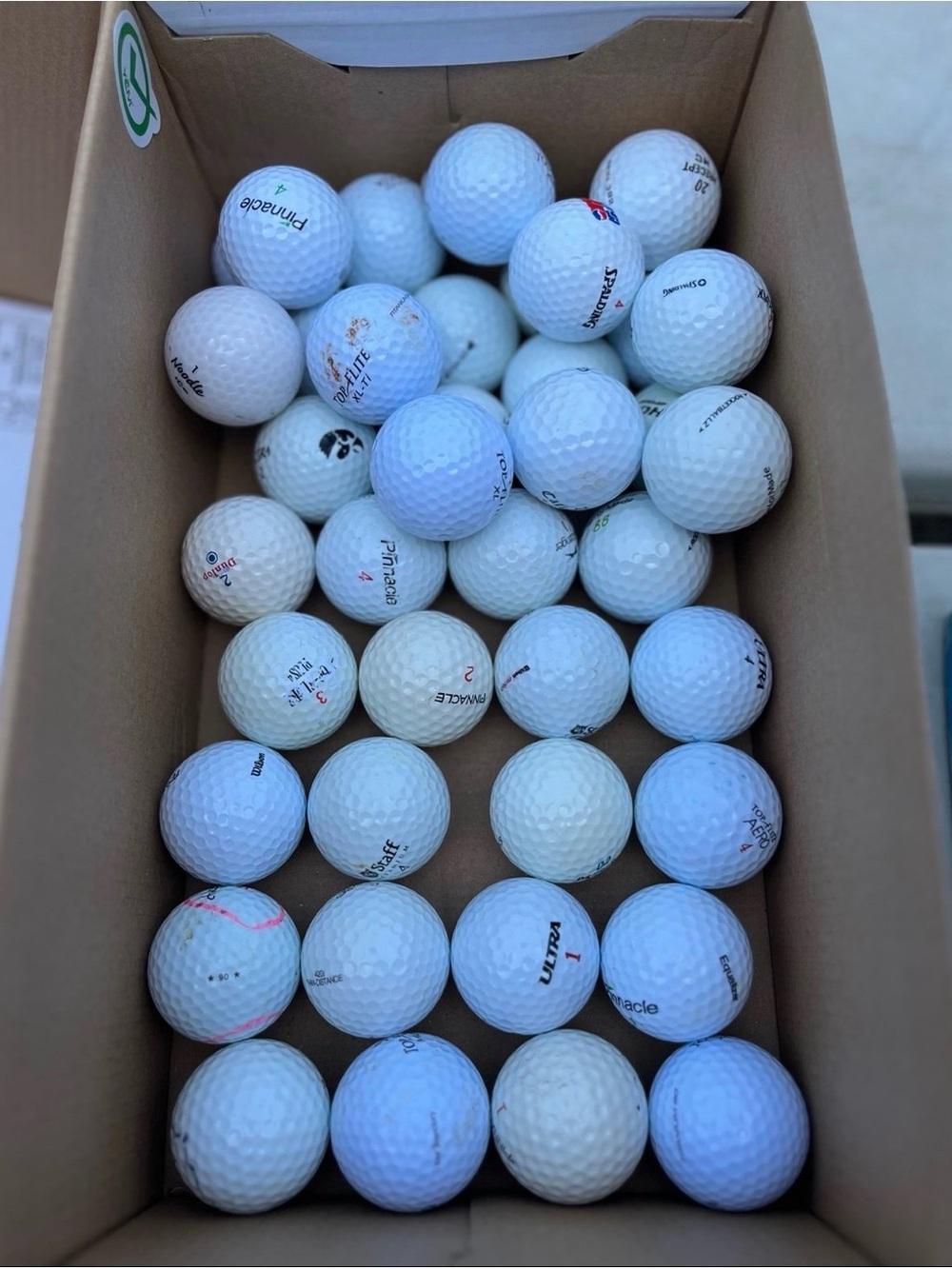 Lot of assorted golf balls all used